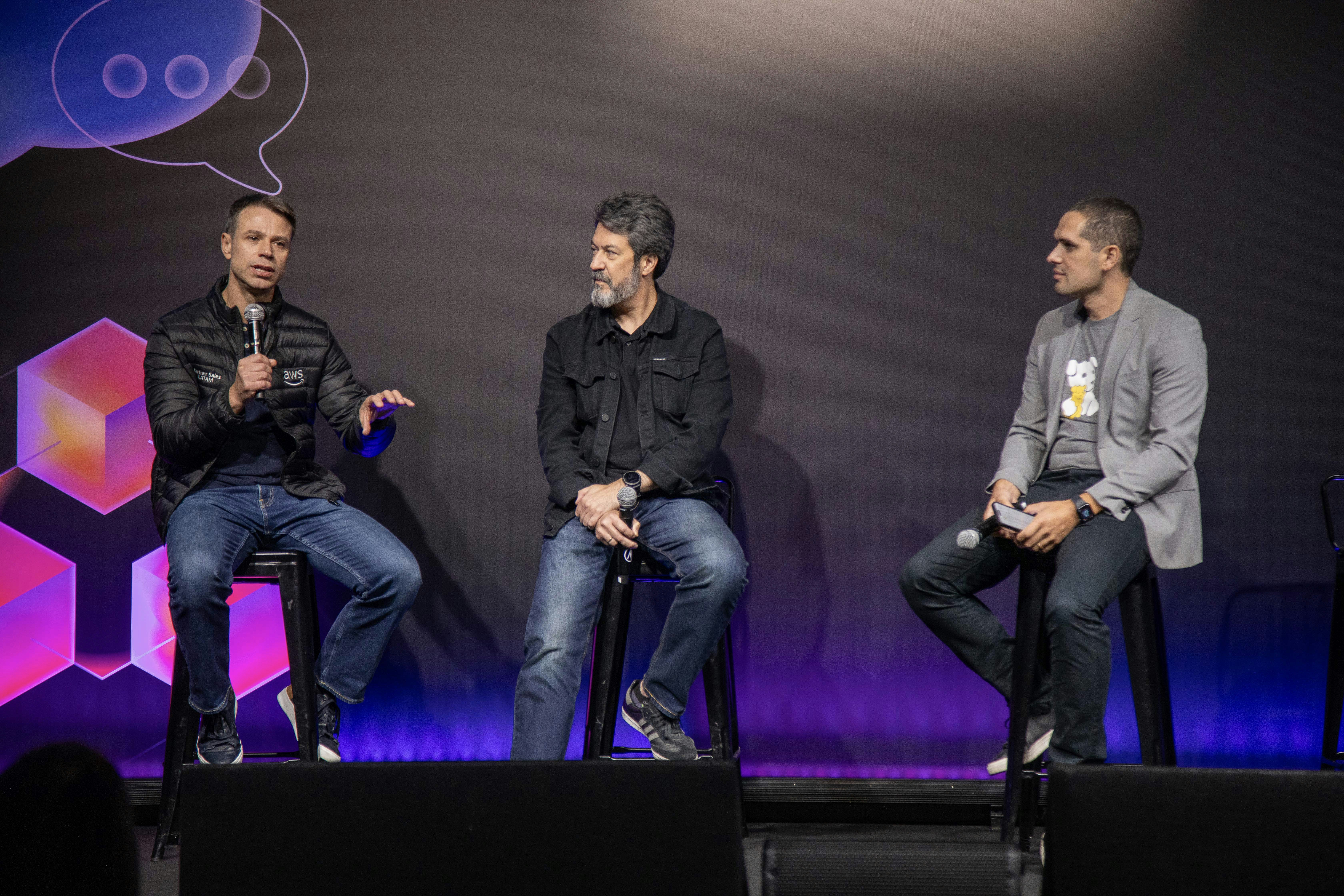 Three people address the audience during a Datadog Summit afternoon session. Three people address the audience during a Datadog Summit afternoon session.