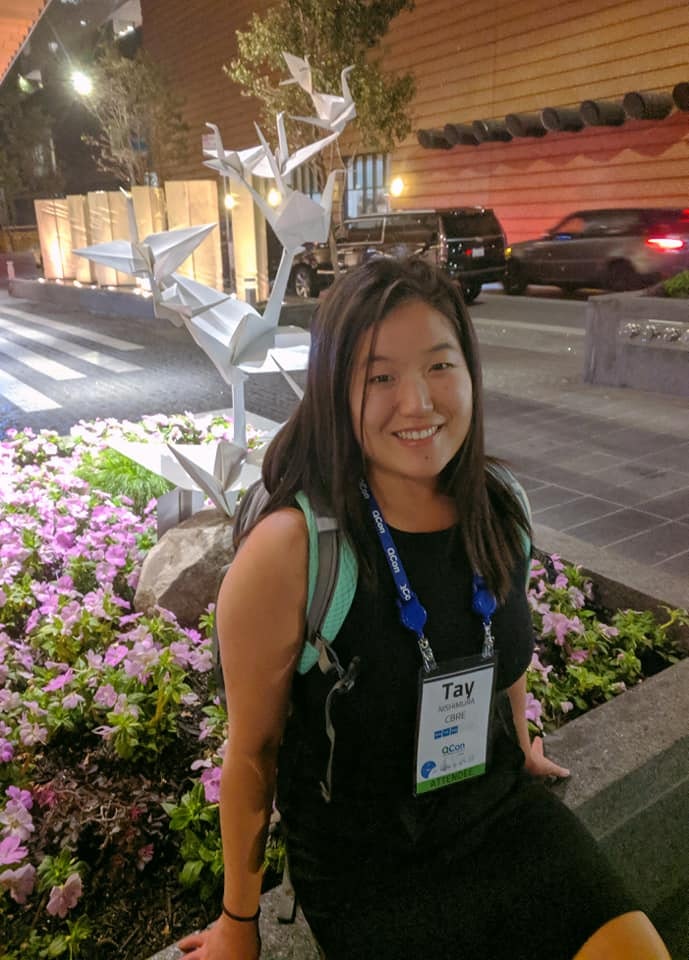 Photograph of Tay Nishimura wearing a backpack. Photograph of Tay Nishimura wearing a backpack.